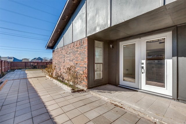 doorway to property with a patio area