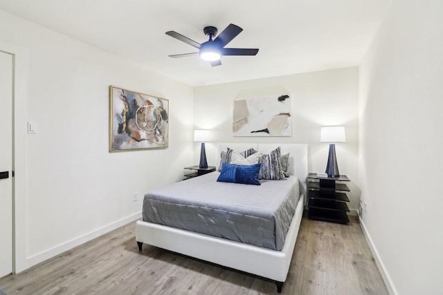 bedroom featuring light hardwood / wood-style flooring and ceiling fan