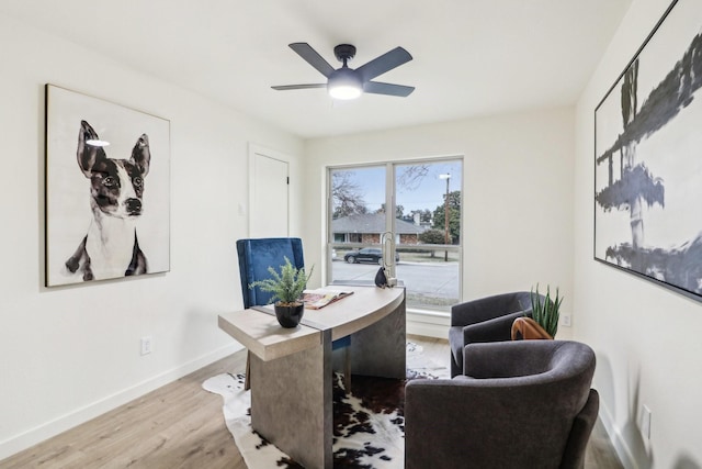 office area featuring ceiling fan and light hardwood / wood-style floors