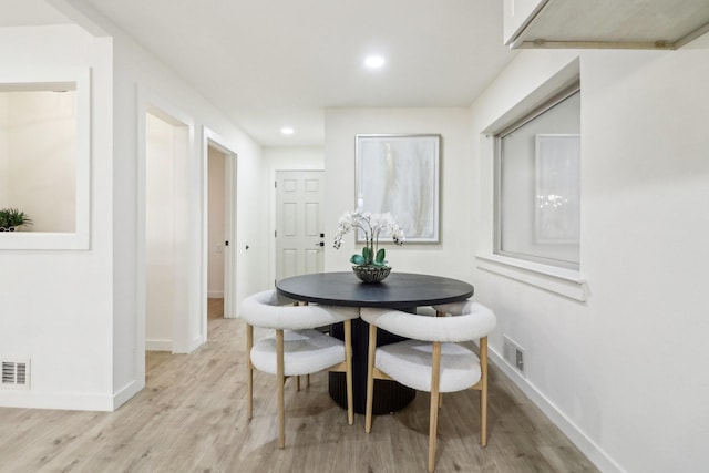 dining area featuring light hardwood / wood-style flooring