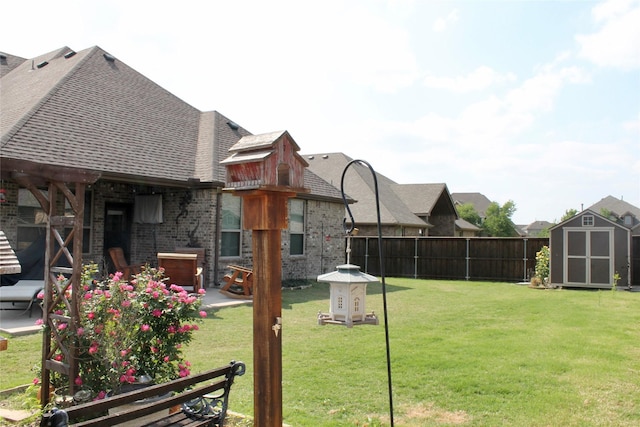 1625 Veneto Dr, Mclendon Chisholm, TX 75032 - view of yard with a patio, a fenced backyard, an outbuilding, and a storage shed