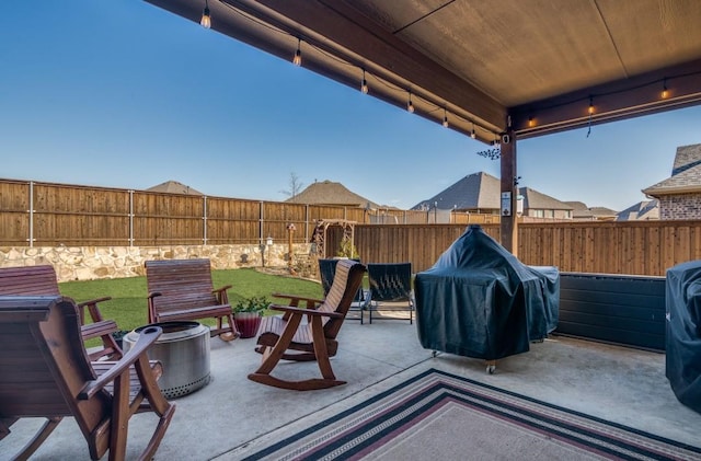 view of patio featuring a grill