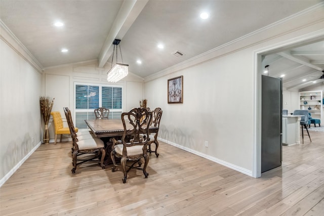 dining space featuring light hardwood / wood-style floors, vaulted ceiling with beams, and ornamental molding