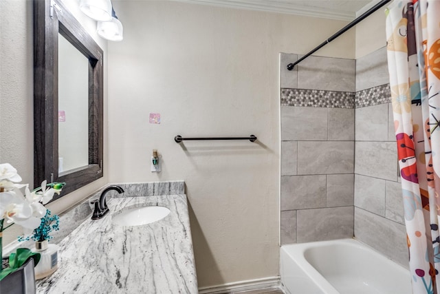 bathroom featuring sink, crown molding, and shower / bathtub combination with curtain