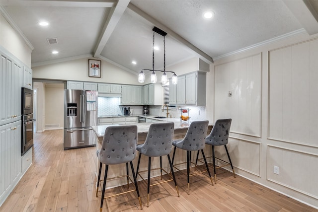 kitchen with high end refrigerator, hanging light fixtures, light hardwood / wood-style flooring, kitchen peninsula, and lofted ceiling with beams