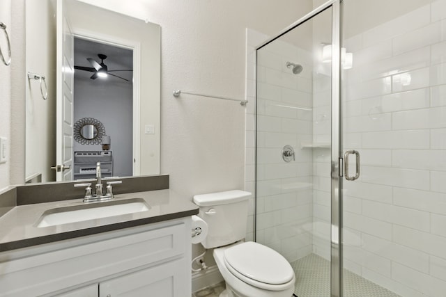 bathroom with vanity, toilet, and walk in shower