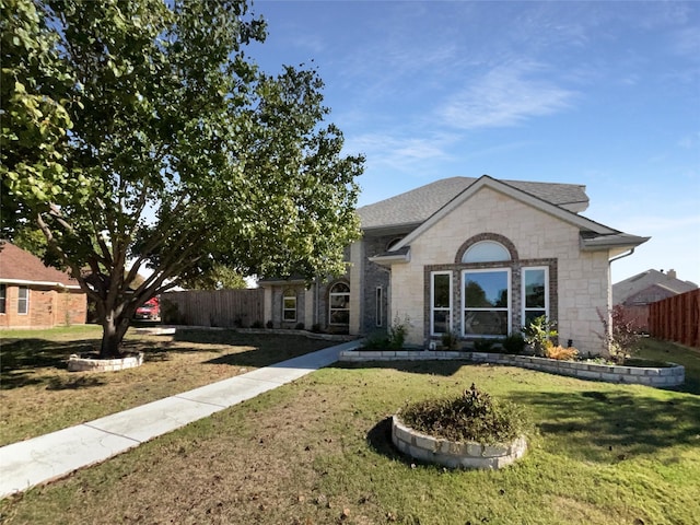 view of front facade with a front yard