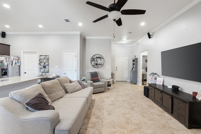 living room with crown molding and ceiling fan