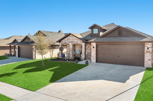 craftsman house with a garage and a front yard