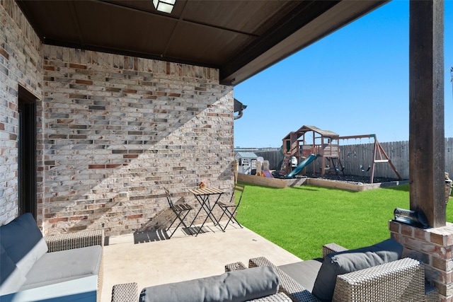 view of patio / terrace with outdoor lounge area and a playground