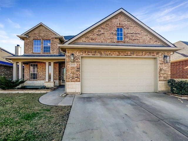 view of front of house with a garage