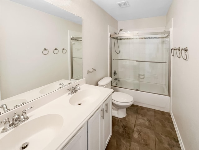 full bathroom with vanity, toilet, and combined bath / shower with glass door