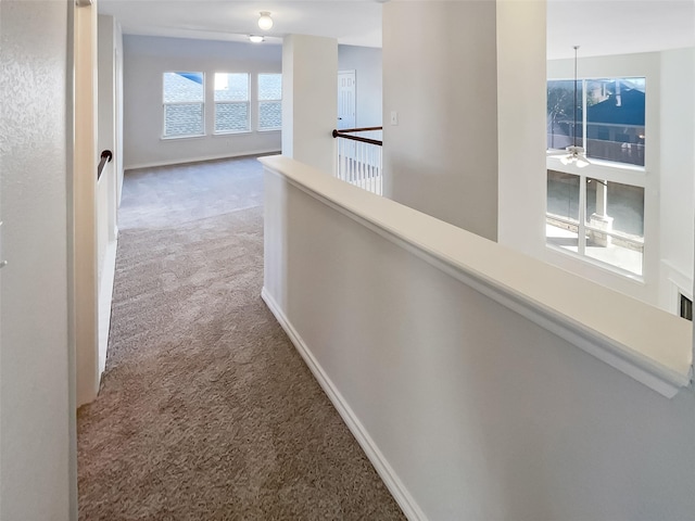 corridor with carpet floors