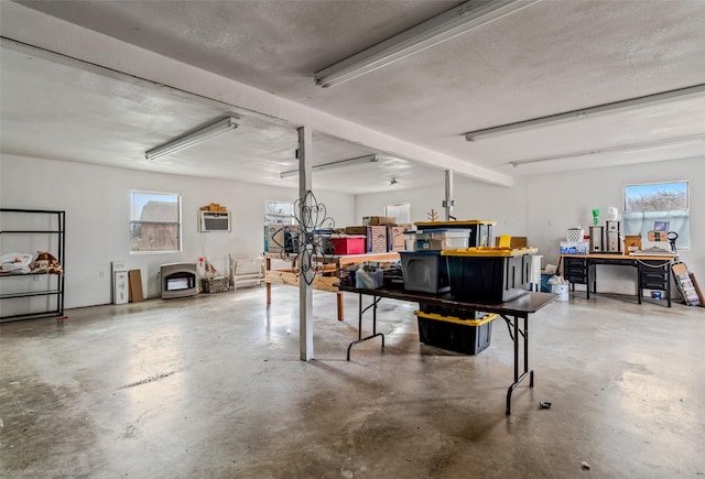 garage with an AC wall unit