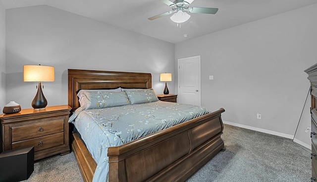 carpeted bedroom featuring ceiling fan and vaulted ceiling