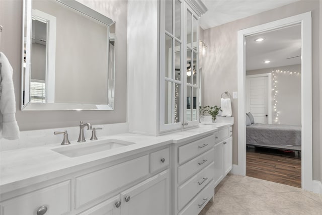 bathroom with vanity and tile patterned floors