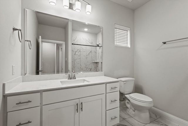 bathroom featuring toilet, walk in shower, and vanity