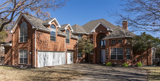 front of property with a garage