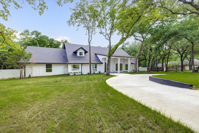 view of front of home with a front lawn