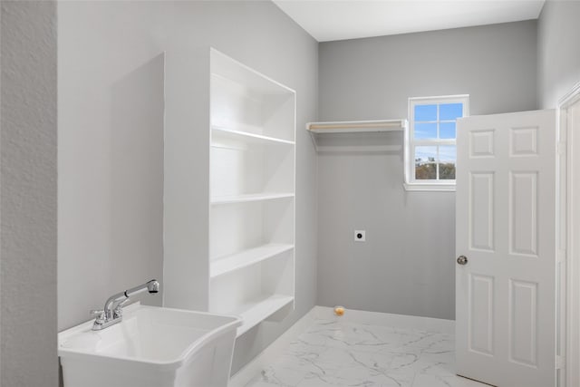 bathroom with a tub and vanity