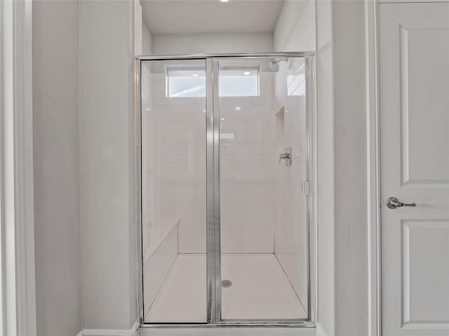 bathroom with an enclosed shower