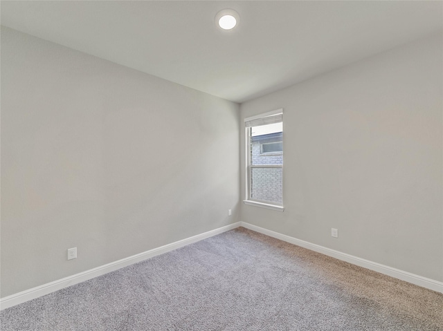 empty room featuring carpet flooring