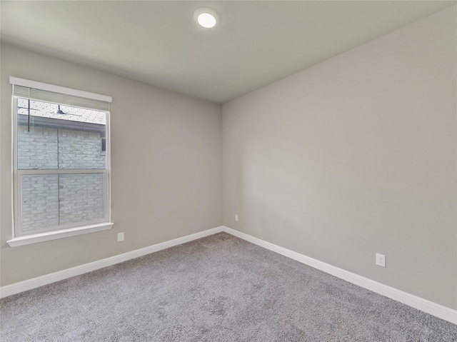 view of carpeted spare room