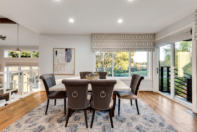 dining room featuring light hardwood / wood-style flooring