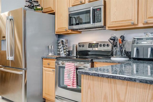 kitchen with appliances with stainless steel finishes