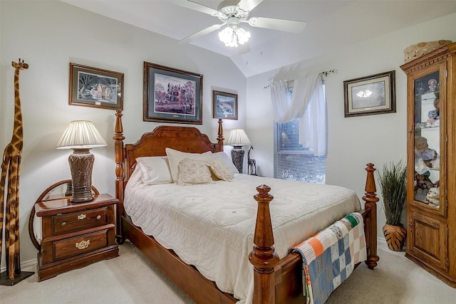 carpeted bedroom featuring ceiling fan and lofted ceiling