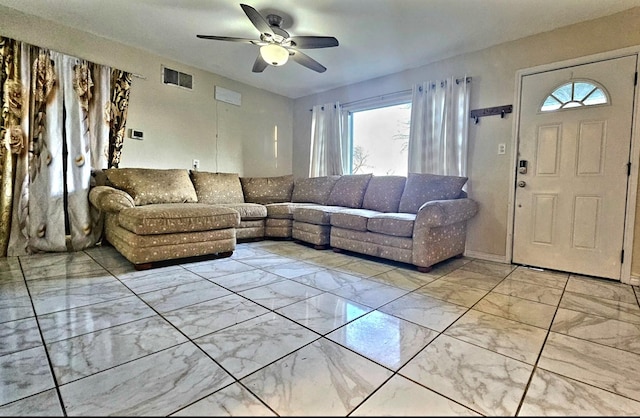 living room with ceiling fan