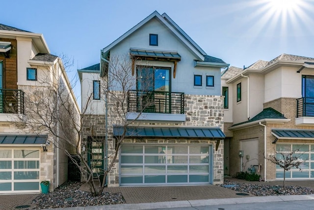 view of front of property with a garage