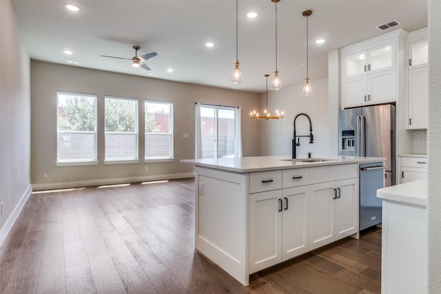 7836 Minglewood Ln, Dallas, TX 75231 - kitchen featuring a sink, appliances with stainless steel finishes, dark wood-style flooring, ceiling fan, and open floor plan