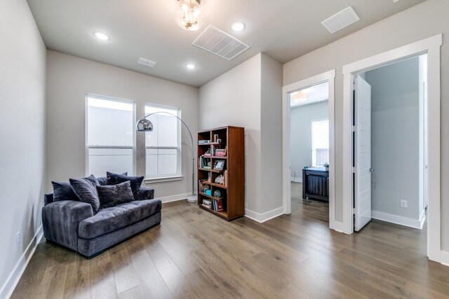 living area featuring dark hardwood / wood-style flooring