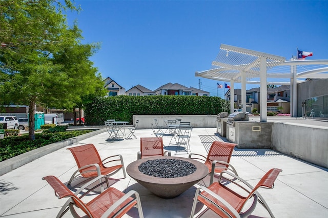 7836 Minglewood Ln, Dallas, TX 75231 - view of patio / terrace with an outdoor fire pit, a pergola, and a residential view