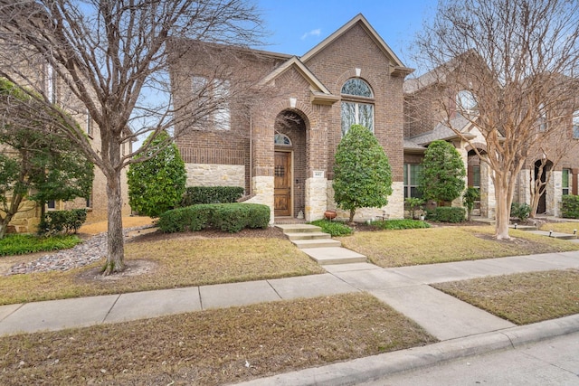 view of property with a front lawn