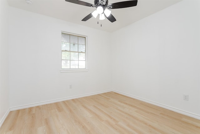 unfurnished room featuring light hardwood / wood-style floors and ceiling fan