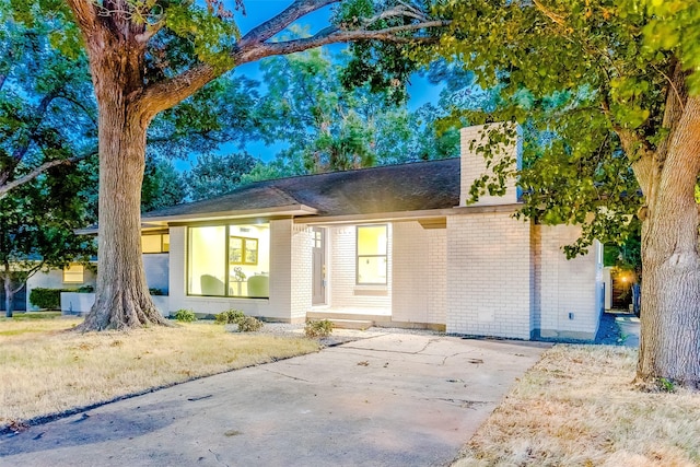 ranch-style house with a front yard