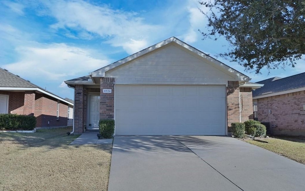 ranch-style house with a garage