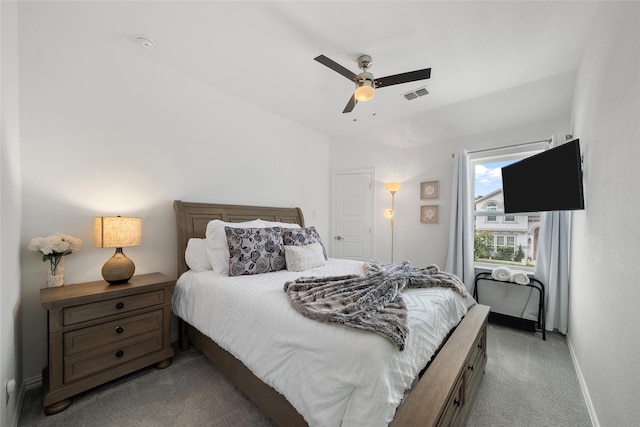 carpeted bedroom with ceiling fan