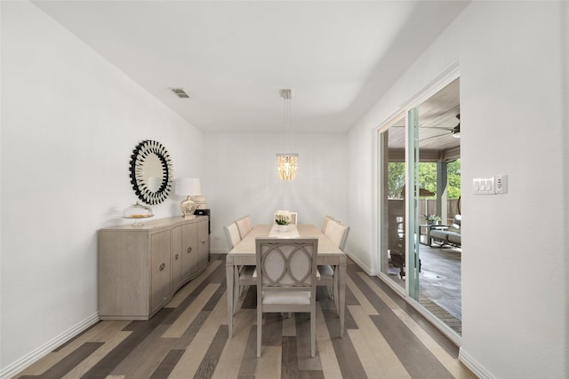 dining room featuring an inviting chandelier