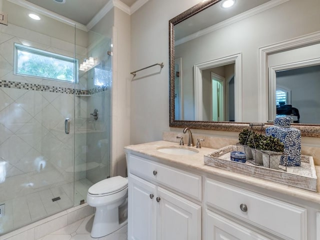 bathroom with crown molding, tile patterned flooring, toilet, walk in shower, and vanity