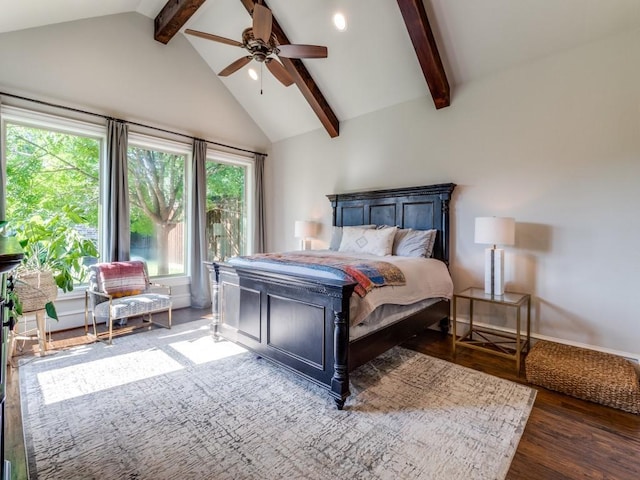 bedroom featuring ceiling fan, dark hardwood / wood-style flooring, beam ceiling, and high vaulted ceiling