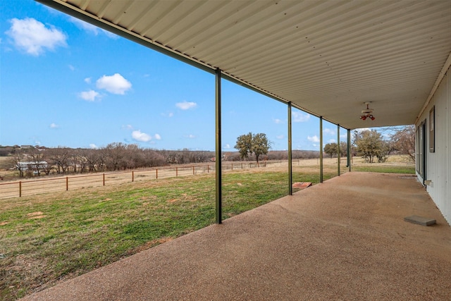 view of patio / terrace with a rural view