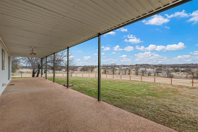 view of patio with a rural view