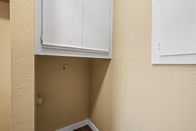 clothes washing area featuring hookup for an electric dryer