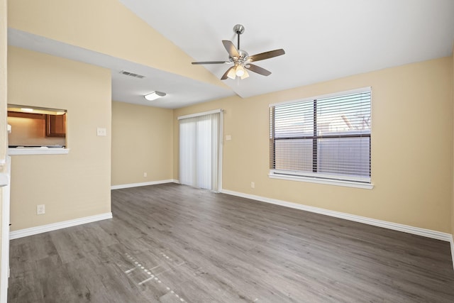 unfurnished living room featuring hardwood / wood-style flooring, ceiling fan, and lofted ceiling