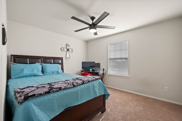 bedroom featuring carpet floors, baseboards, and a ceiling fan