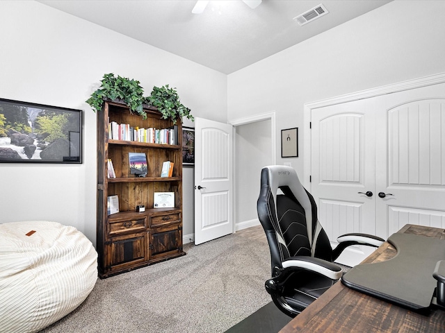 office space featuring ceiling fan and carpet flooring