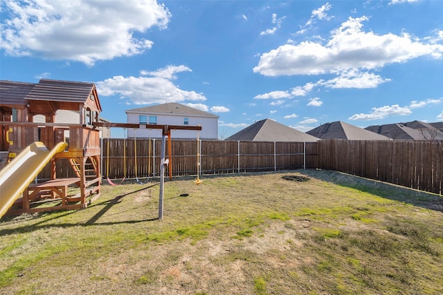 view of yard with a playground